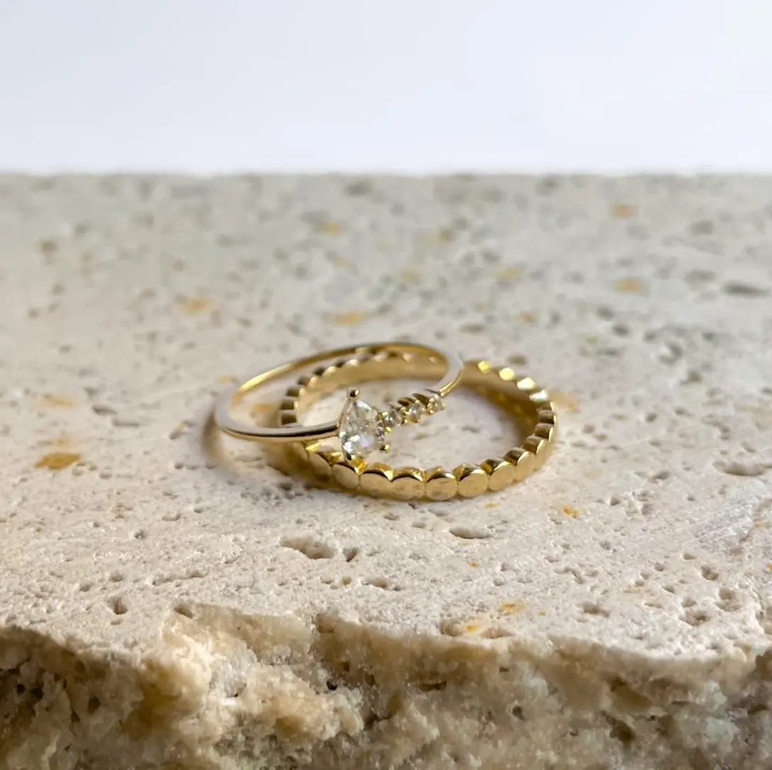 Close-up of a Cala Luna gold-plated sterling silver ring in natural light